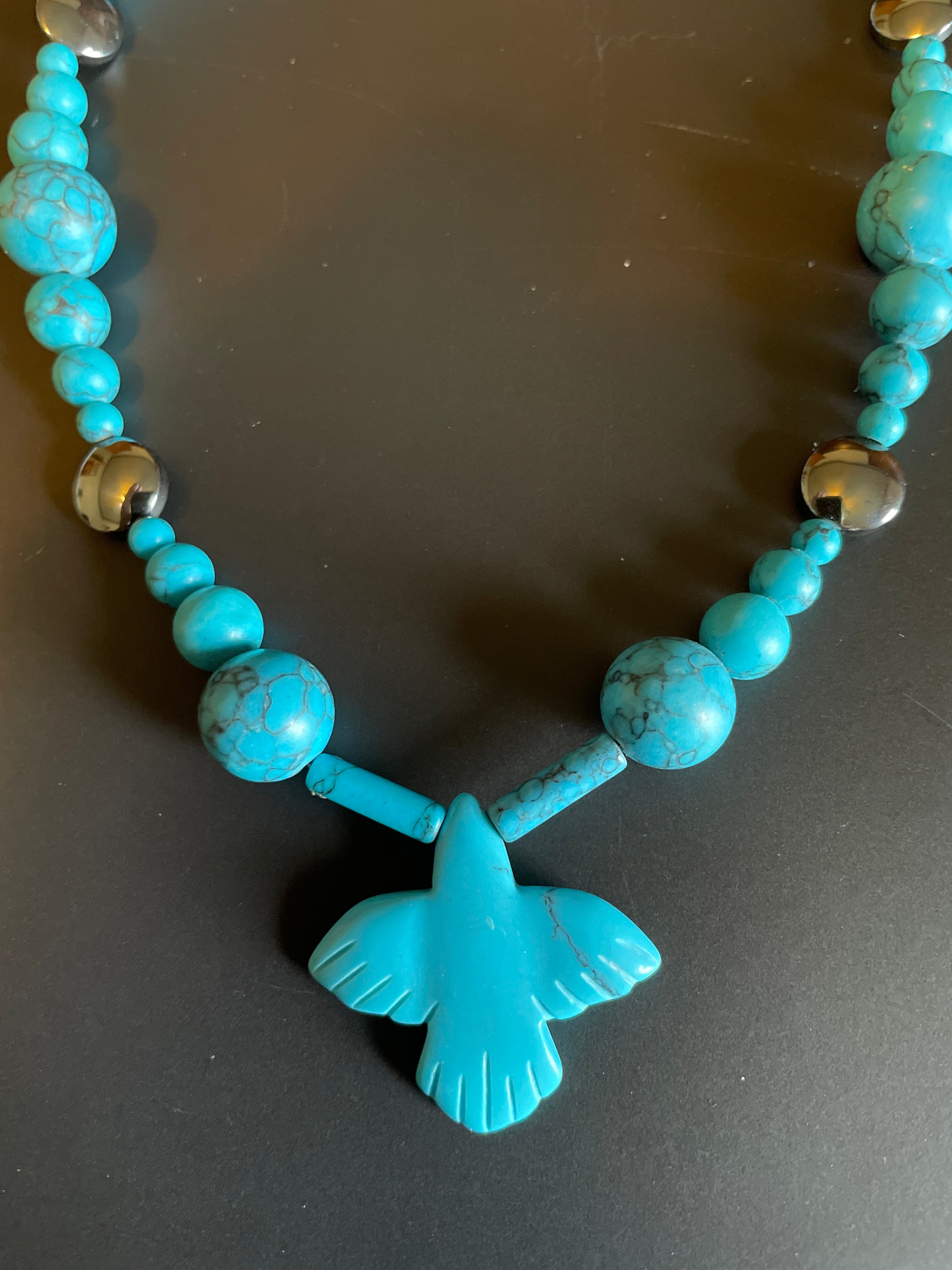 Carved turquoise eagle pendant necklace
